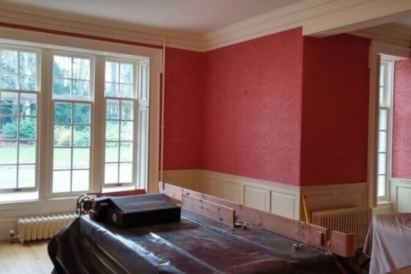 New wallpaper, red wallpaper with embossed detailing and textured surface